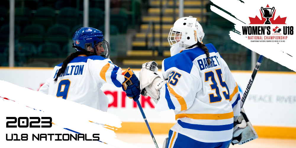 Image: Team Alberta player Molly Hamilton (left) fist bumps Team Alberta Goaltender Alyssa Barrette (right) after a goal